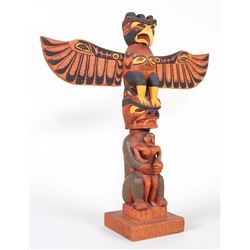 Simon Charlie Totem Carved with Thunderbird and Bear Holding a Human - Signed  24" H. 22 1/4" W.  Go
