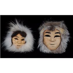 Two Inuit Masks 9" H. and 8 1/4" H.  Good Condition NOT ALLOWED TO SHIP OUTSIDE CANADA