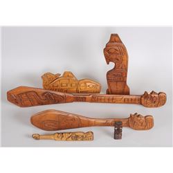 Two Kwakiutl Dance Paddles 24 1/2" L. - 35" L. Fair Condition, Two Carved Plaques 13" W. - 15" W., a