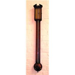 An early 19th century mahogany and inlaid stick barometer by Stenson,     Derby....