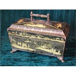 A Regency penwork sarcophagus form tea caddy with hinged lid enclosing   fitted interior (lacking...