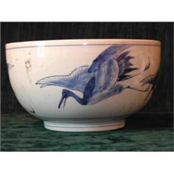 An interesting and unusual antique porcelain? bowl decorated with flying...