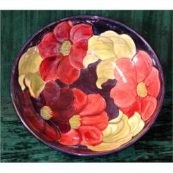 A 1930's Moorcroft bowl decorated with poppies on a blue ground, diameter...