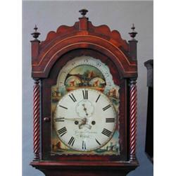 An early 19th century mahogany and inlaid eight day longcase clock...