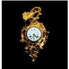 Image 1 : Reloj "cartel" Luis XV en bronce dorado. Trabajo francés o español, h.1750. Medidas: 36 x 19 cms....