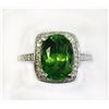 Image 1 : PERIDOT 4.46CT, 14K W/G RING 4.82GRAM / DIAMOND RD 0.45CT