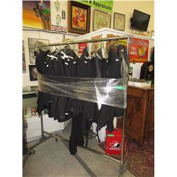 Rack of men's assorted tuxedos & suits