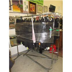 Rack of men's assorted tuxedos & suits