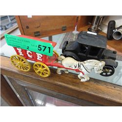 2 Cast metal toys with moveable wheels