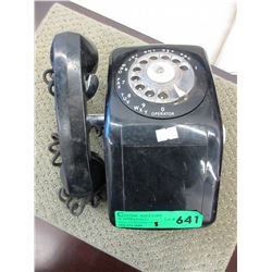 Vintage wall hanging rotary dial telephone