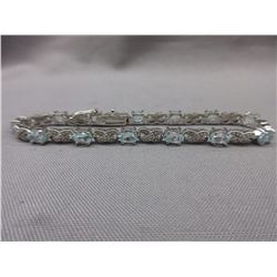 Blue Topaz & Diamond figure 8 bracelet