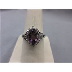 2+ CT Amethyst ring set with 4 Diamonds