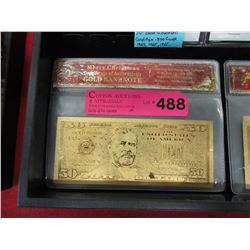 2 Gold foil novelty bills in Christmas folders