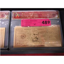 2 Gold foil novelty bills in Christmas folders