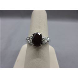 2.10 CT Garnet Ring set with 4 Diamonds