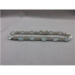Blue Topaz & Diamond Tennis Bracelet