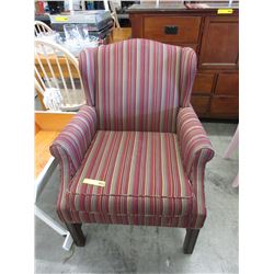 Used upholstered wing chair
