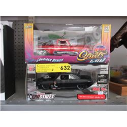 2 Die-cast scale model cars