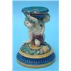 A Minton majolica comport stand, modelled as two bachanals, one with garlands of grapes, the othe...