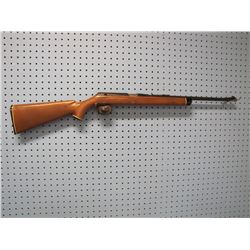 Daisy VL Rifle; A .22 combustible cartridge single shot rifle, with a 18” barrel and a plastic stock