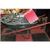 Image 1 : GREEN WHEELBARROW WITH HEAVY DUTY CORDS AND