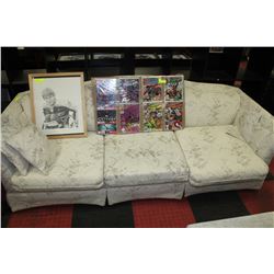 IVORY SOFA WITH FLORAL PATTERN