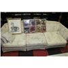 Image 1 : IVORY SOFA WITH FLORAL PATTERN