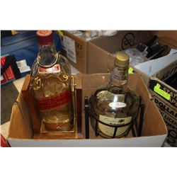PAIR OF OLD LIQUOR BOTTLES WITH STANDS