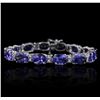 Image 1 : 14KT White Gold 27.12ctw Tanzanite and Diamond Bracelet