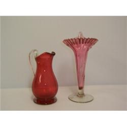 CRANBERRY GLASS JUG, with applied clear glass handle,  height 6 ins 30 - 50...