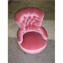 VICTORIAN/EDWARDIAN UPHOLSTERED NURSING CHAIR, with button back and low arms on turned feet and cas.
