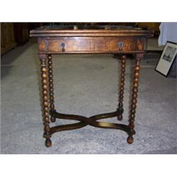EARLY 20TH CENT. OAK CARD TABLE, with fold-over swivel top, single drawer on bobbin work legs and c.