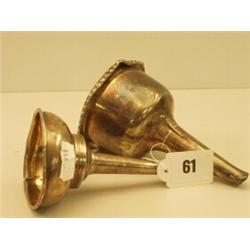Two Georgian silver wine funnels…