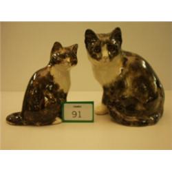 Two Winstanley seated pottery cats, 8" and 7" high…
