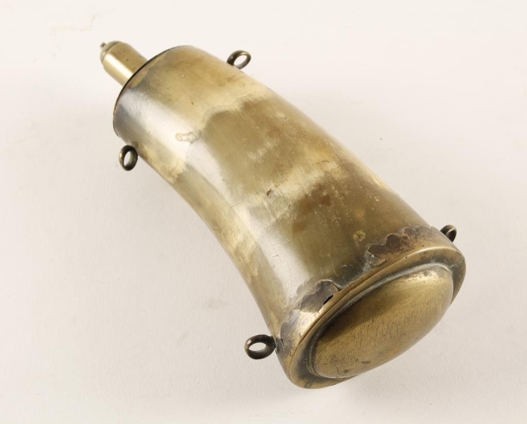 Large antique horn powder flask with brass mounts and four hanging rings;