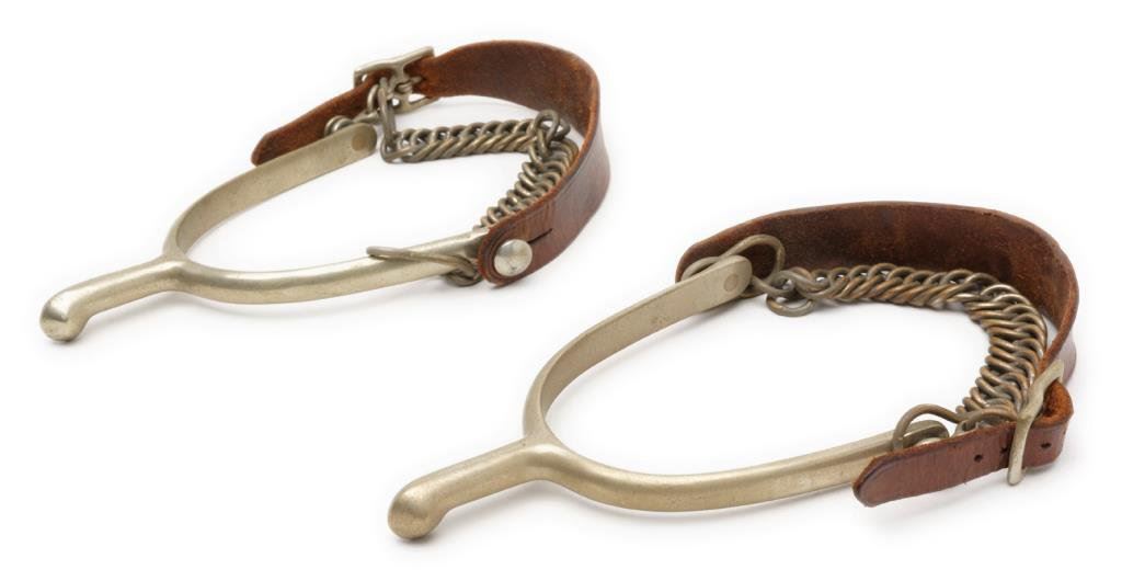 Pair of military spurs with heel chains and leather straps, each marked “U