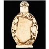 Image 1 : Carved fossilized bone snuff bottle with turquoise  top. 18th to 19th centu