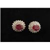 Image 1 : One contemporary designer earring set in 14k white  gold set with rubies an