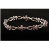 Image 1 : One 18k white gold floral style bracelet set with  pink sapphire(6.42ct) an