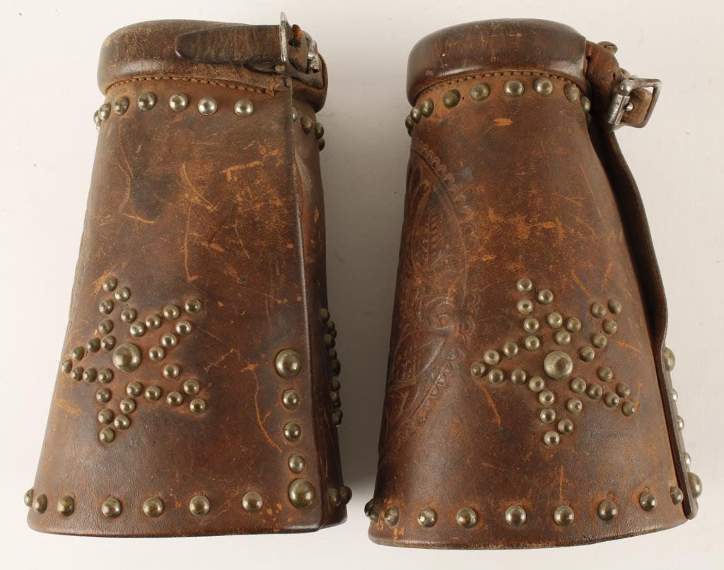 Pair of heavy duty leather working cowboy chaps with brass decoration and