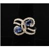 Image 1 : One 18k white gold custom designed sapphire  and diamond ring. 2 oval sapph
