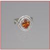 Image 2 : Sensational FINE Orange Sapphire and Diamond  Ring featuring a 2.50 carat o