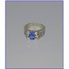 Image 4 : Elegant Blue Tanzanite and Diamond Ring  featuring an oval tanzanite weighi