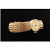Image 2 : 14K yellow gold Ladies Geneve wrist watch in  good working condition. (weig
