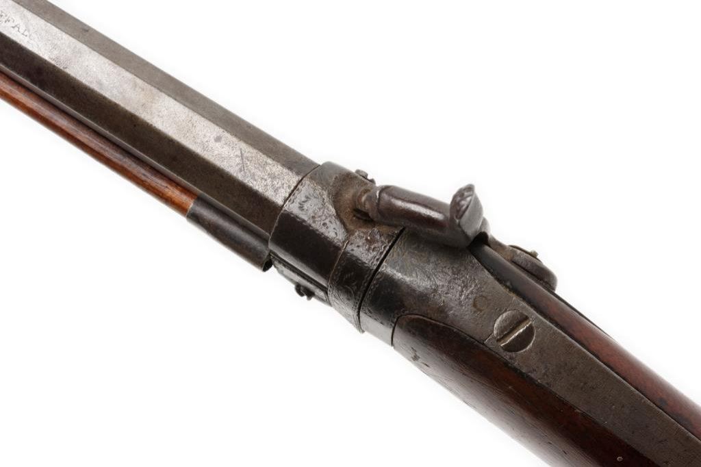 Percussion O/U swivel breech gun; both barrels .50 caliber smoothbore31” h