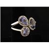 Image 2 : 14K White Gold ring set with approx. 6 carats  plus Tanzanites and surround