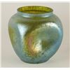 Image 1 : Loetz vase with pinched side in iridescent  green color. Est.: $500-$1000