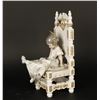 Image 1 : Spanish girl on chair signed Lladro;  approximately 11&#8221; in height.     Est.