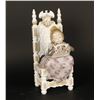 Image 1 : Spanish mission on chair with basket of  flowers; 10.5&#8221; in height.   Est.:
