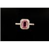 Image 1 : One 18k ladies ring set with emerald cut pink  sapphire weighing 1.5ct and